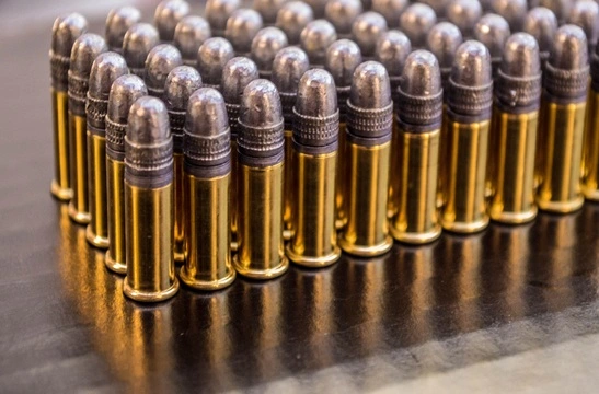 Load ammunition into the case